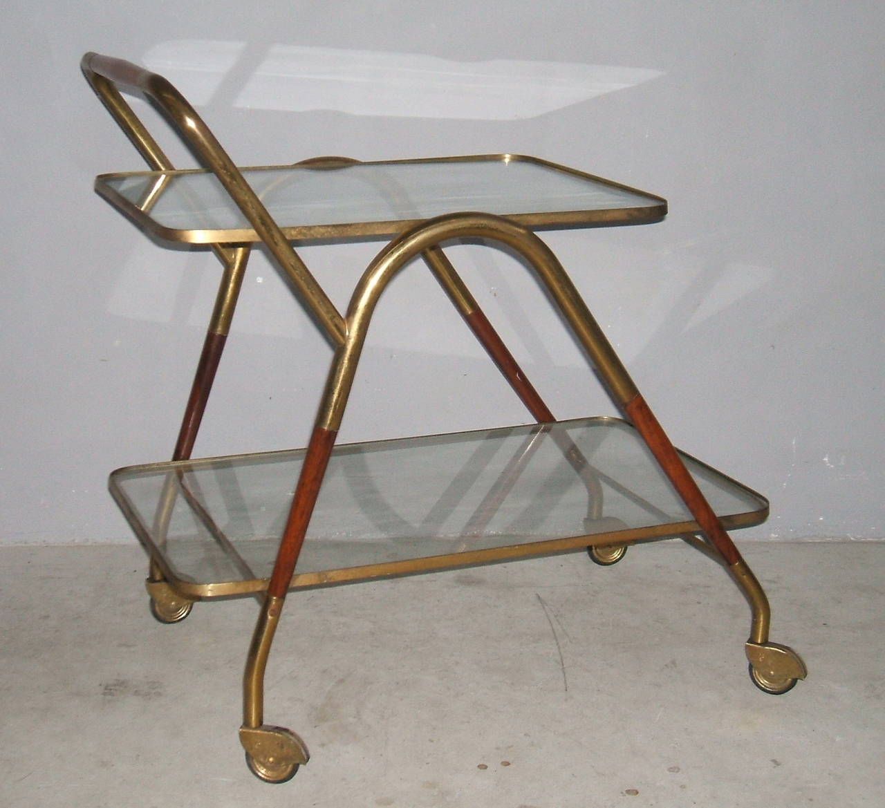 Smart bar cart by Cesare Lacca.
Two tired with glass. Brass and wood