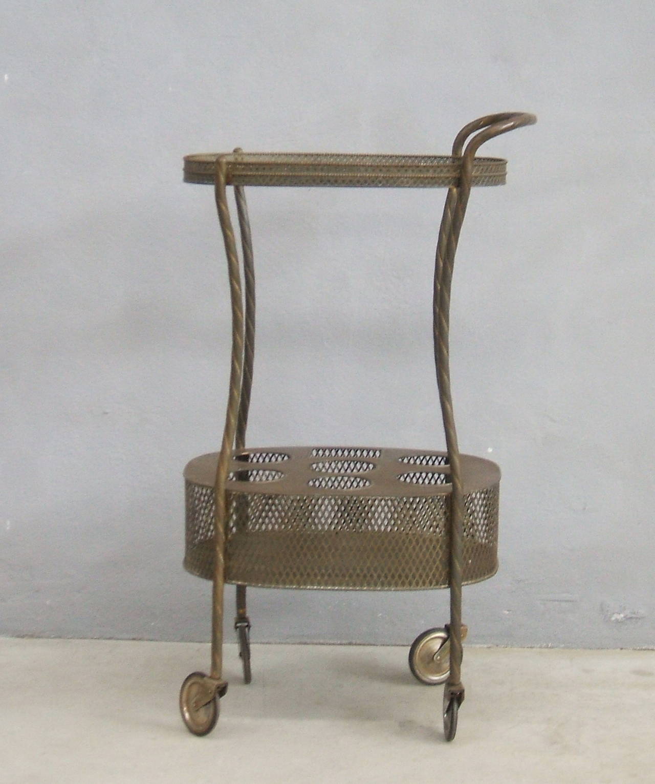 Unusual brass bar cart in original patina.
