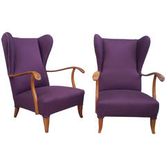 Elegant pair of lounge chairs in the style of Paolo Buffa