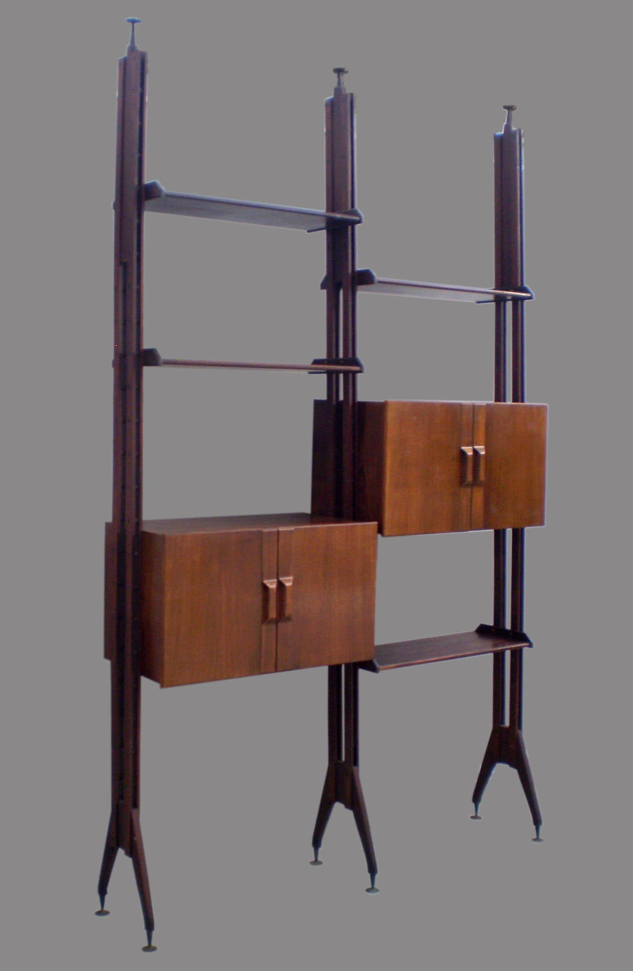 Beautiful Franco Albini style bookshelf. Adjustable wood and metal feet.