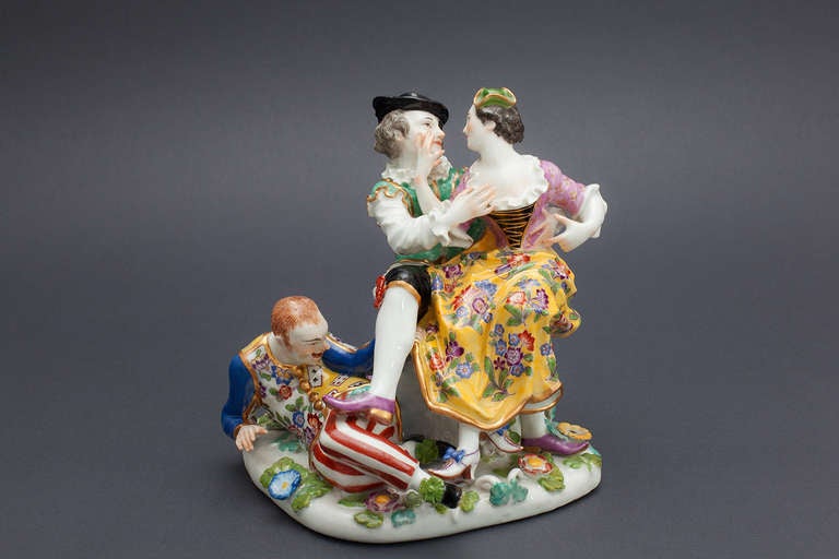 Model by Johann Joachim Kaendler
Meissen c. 1742

Form no: 344 
height: 6.30 inch
Postament: 5.12 x 5.90 inch 
Without swords mark

The design of the Indiscrete Harlequin is made by the Meissen modeller Johann Joachim Kaendler. It was