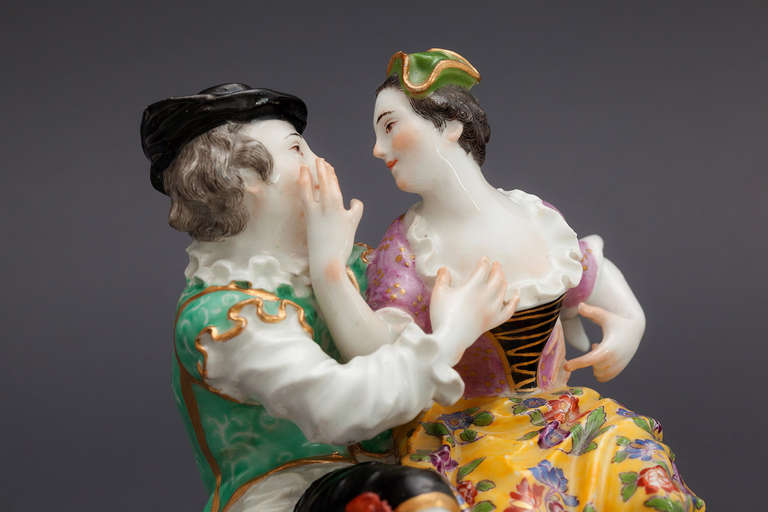 German A Meissen Group of the Indiscrete Harlequin