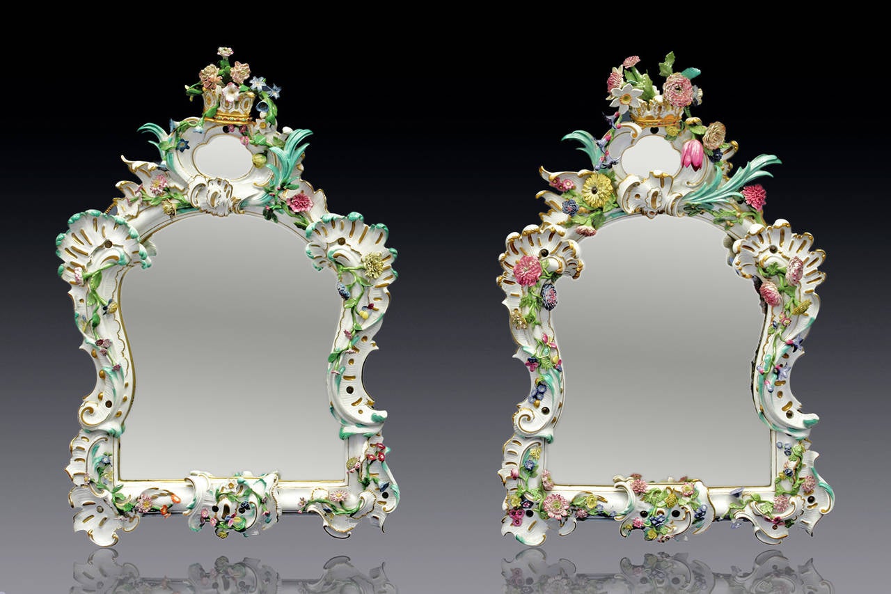 By Johann Joachim Kaendler c. 1746

Provenance: 
- Collection Walther von Pannwitz (the right mirror), (Helbing Munich, 25.10.1905, no. 343)
- Antique Porcelain Company (APC), New York (both mirrors)

Two mirrors, edged by curved porcelain
