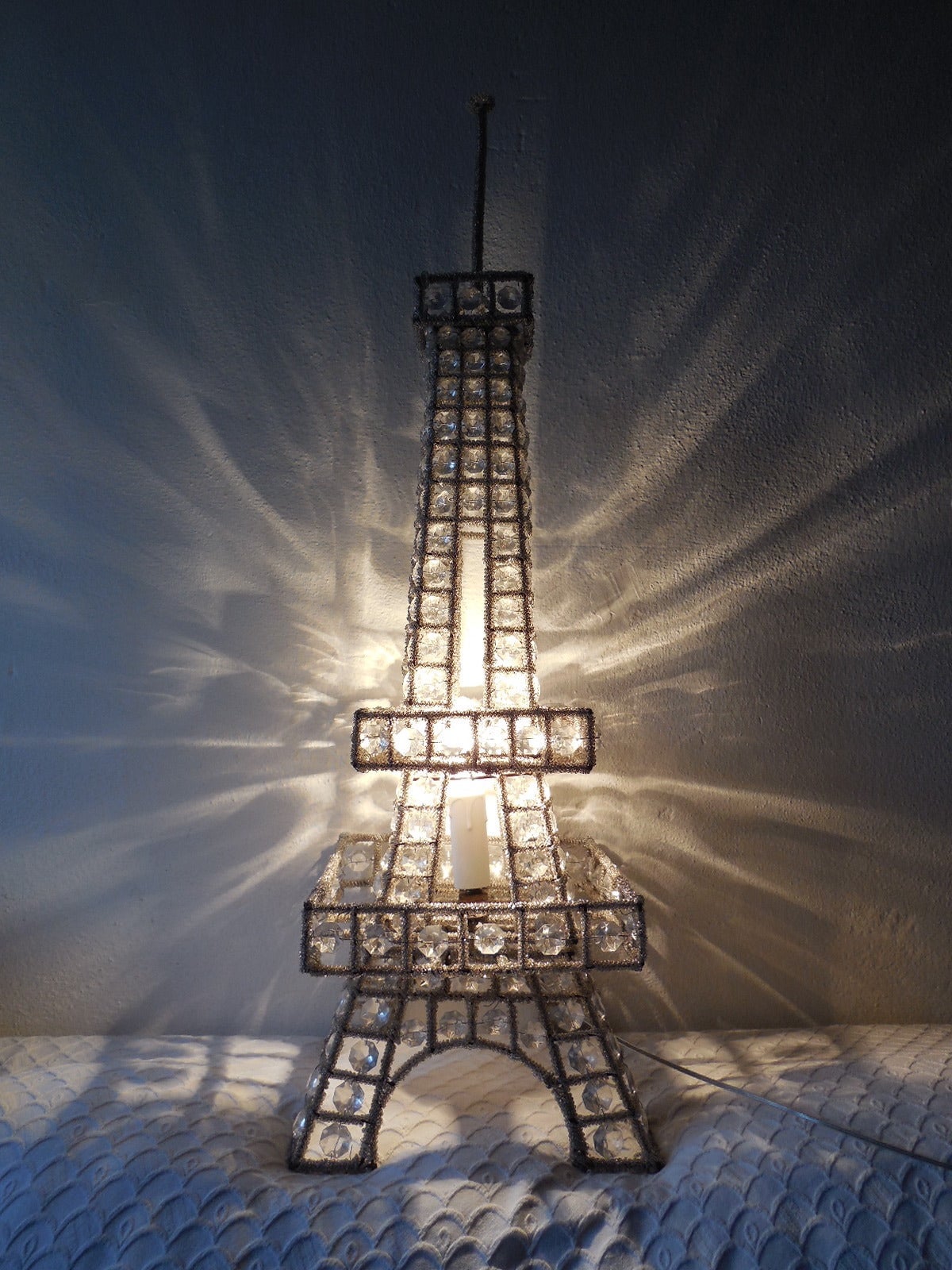One of a kind hand beaded Eiffel Tower lamp.  Found outside of Paris.  Housing 1 light with new U.S. socket and wire.  Flash was used on a few of the pictures which makes it look rusty, which is not.  Free shipping from Italy.