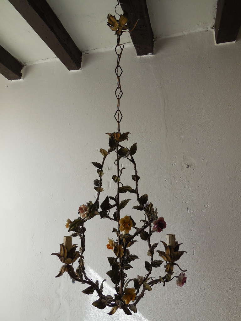 Housing 3 lights, bulb holders in wood. Piedmont style.   Original color huge leaves.  Really big roses and flowers!  All intact.   Gold gilded accents.   Adding 14” of original chain and canopy.  Need to be rewired for U.S. safety standards.