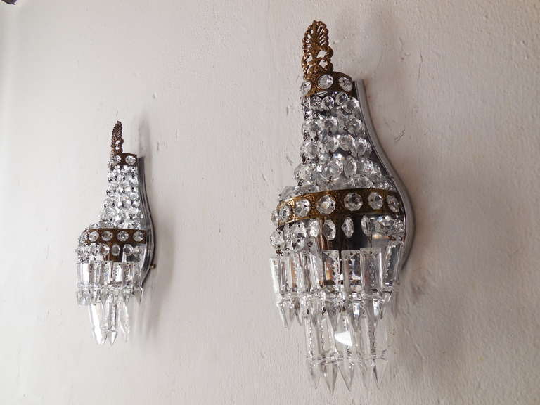 Housing one light each.  Metal back, bronze detailing with crystal prisms inside.  Tiers of crystal spears. Re-wired and ready to hang!  Free priority shipping from Italy.
