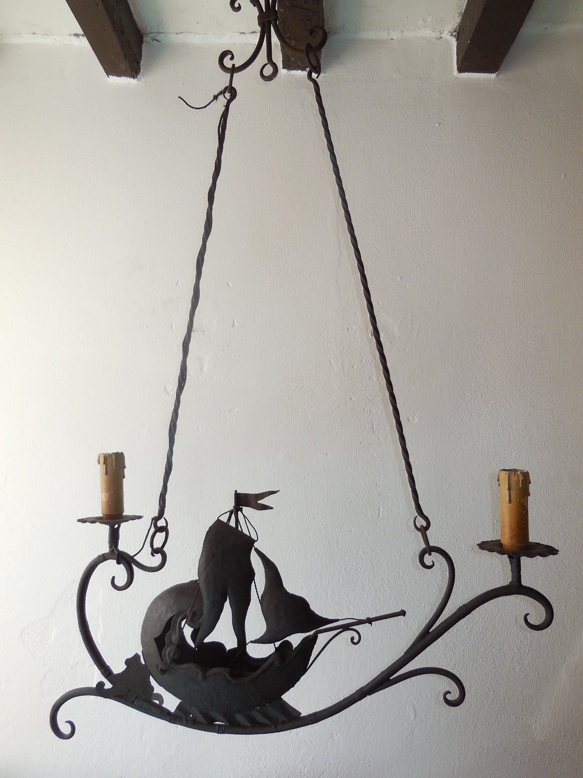 Hand forged wrought iron.  Wonderful detailing with moving flag and water.  Housing 2 lights.  From Flag to bottom measures 16 inches.  Rewired and ready to hang.  Free shipping from Italy.
