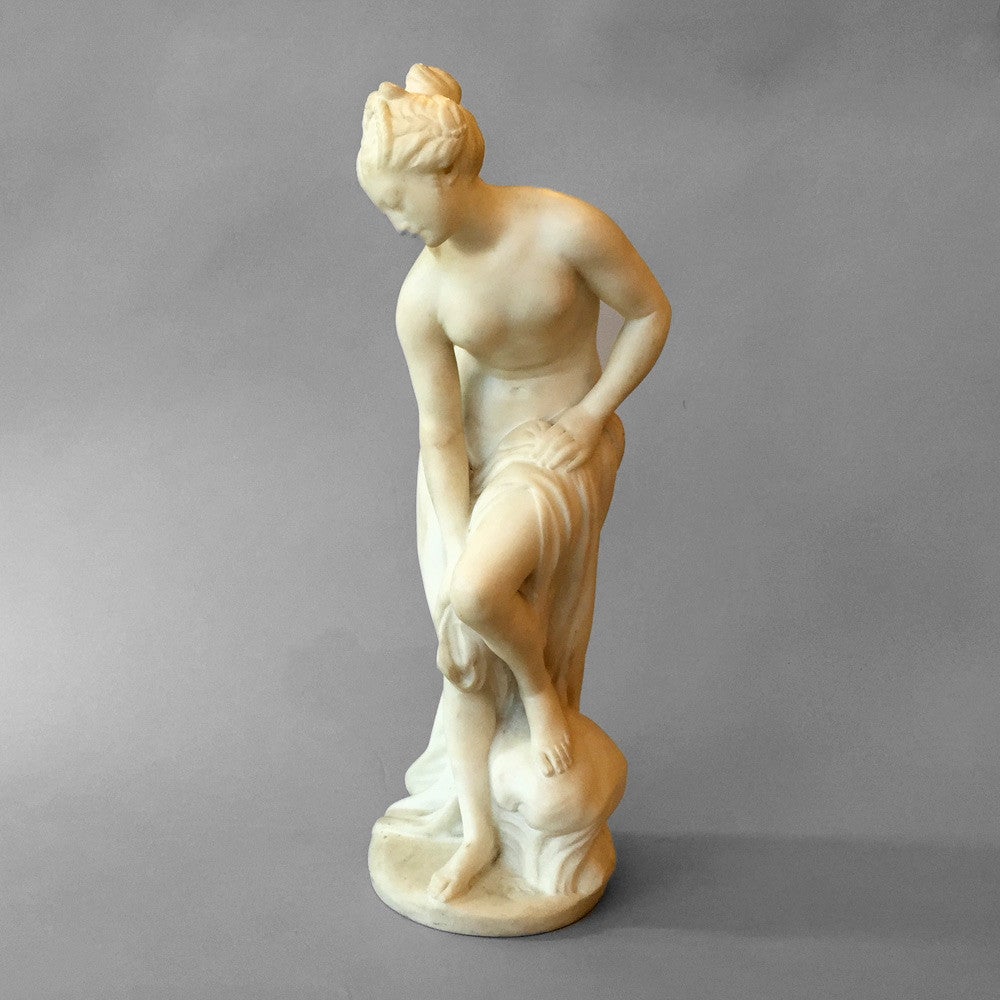 A nineteenth century white marble figure depicting Venus bathing. 

In the manner of Christophe-Gabriel Allegrain (1710 – 1795). 

Allegrain was a French sculptor celebrated for his ability to temper the strong neoclassical style by injected