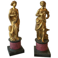 Antique A Pair of 18th Century Gilt Bronze Figures on Faux Porphyry Socles
