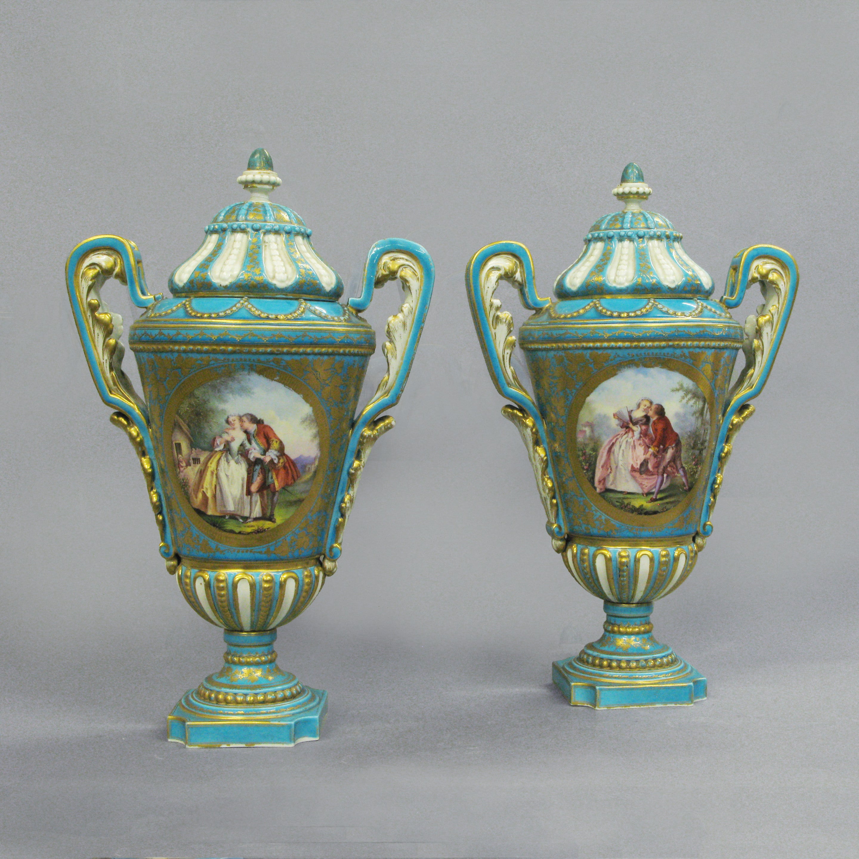 Pair of 19th Century Blue Ground Sevres Vases and Covers
