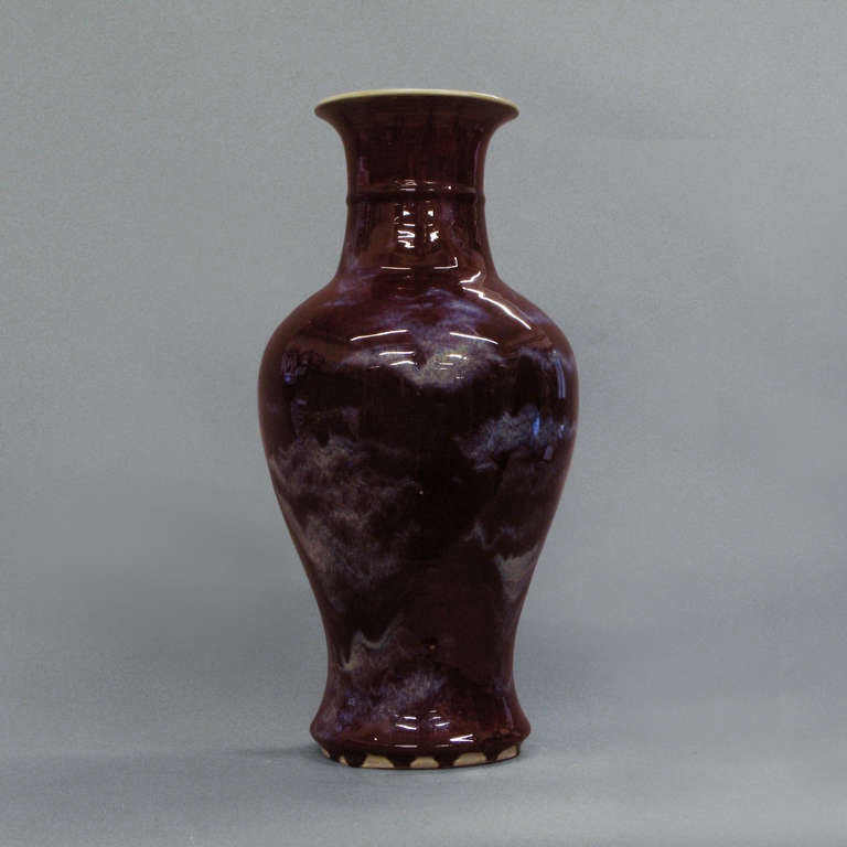 A baluster form vase with rich flambe glaze