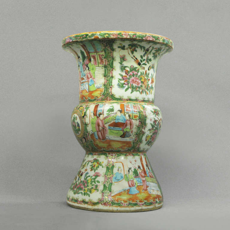 A Canton beaker vase, decorated with court scenes, flowers, foliage and birds