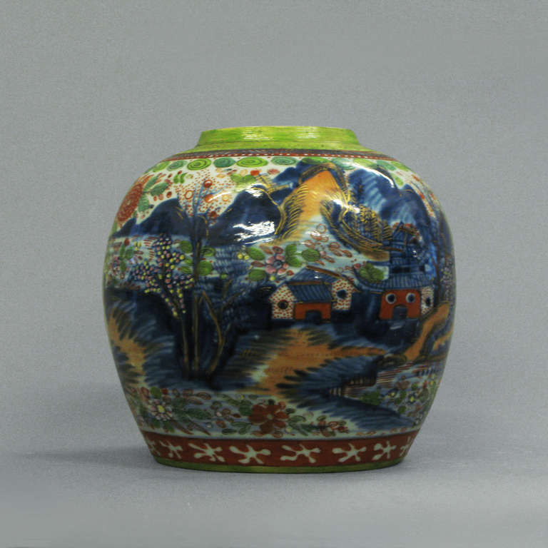A finely decorated clobbered tea jar of bulbous form