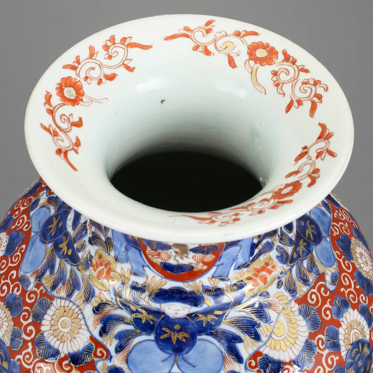 A fine late 19th century Chinese Imari vase of good scale, the surface profusely decorated with red, blue and gilt on a white ground. 

Following the remarkable success of Imari wares in japan in the seventeenth and eighteenth centuries, the