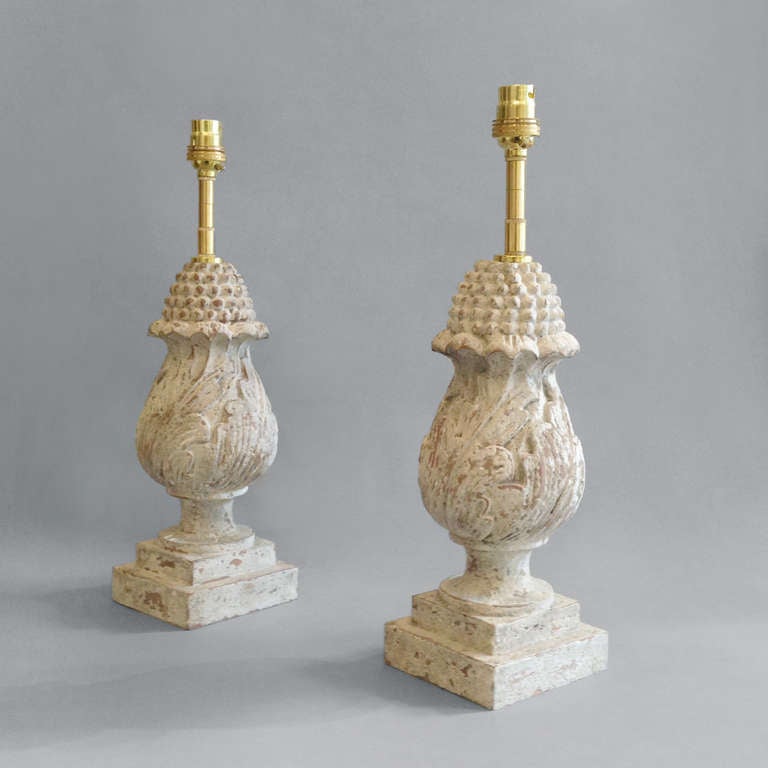 A pair of carved, painted finial lamp bases taking the form of sprouting pomegranates set upon scrolling acanthus leaves.

This lamp base takes its name from the Renaissance Château de Villandry which is located in the centre of the Loire region.