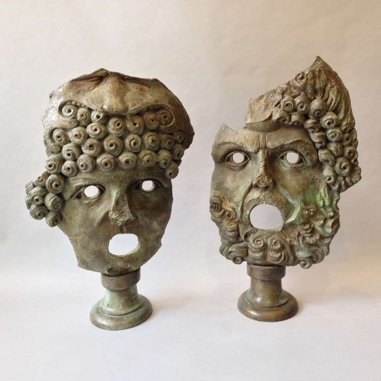 A pair of monumental mid-century bronze masks attributed to Ettore Colla, a figure in the Novocento movement which was founded in Milan in 1922.

These bronzes would appear to form part of a series of models for monuments and monumental sculptures