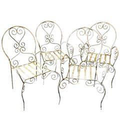 Set of Four Painted Cast and Wrought Iron Garden Chairs
