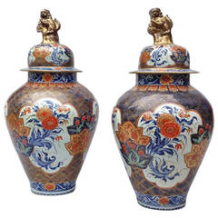 Large 17th Century Pair of Imari Vases and Covers