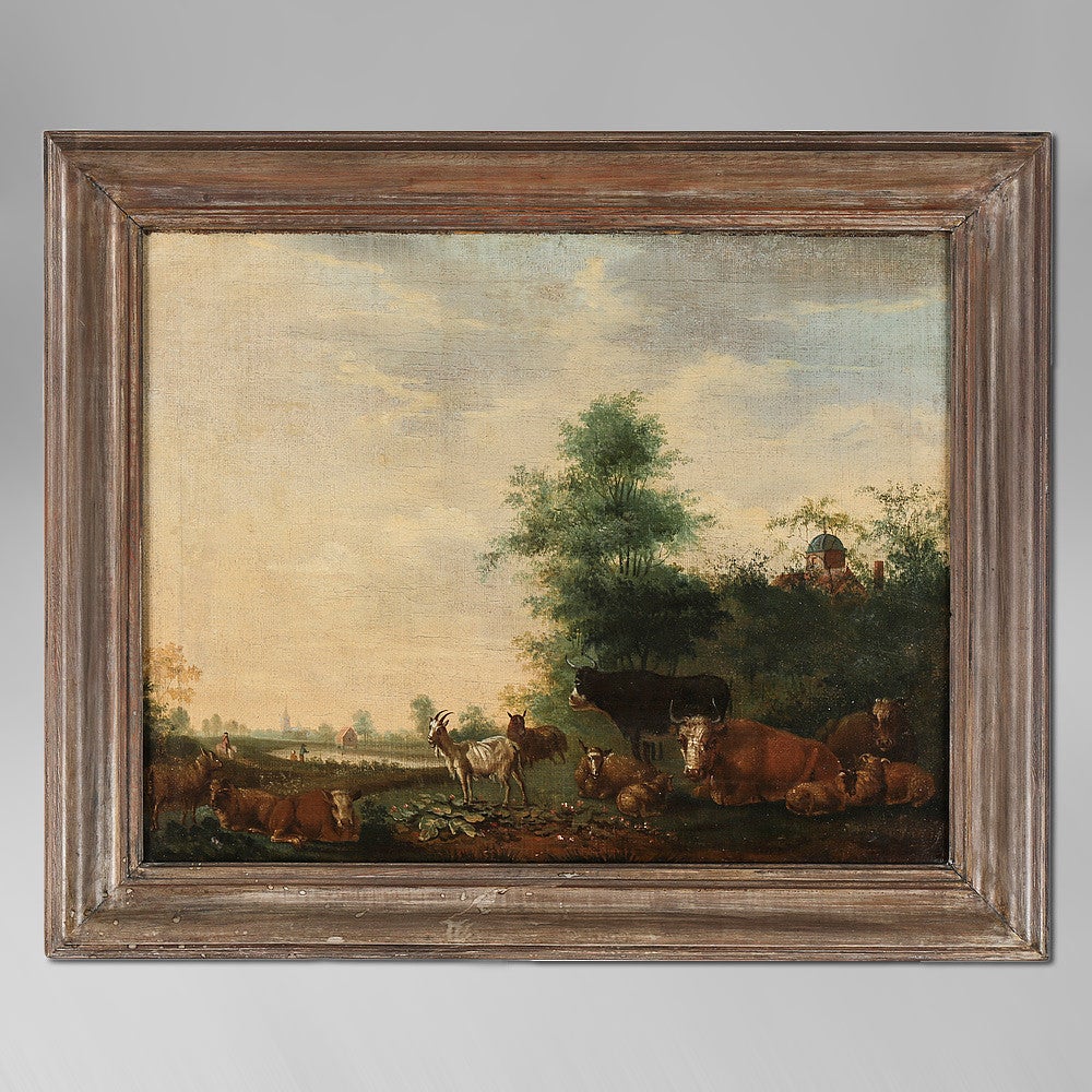 An early 18th century pastoral landscape, depicting grazing cattle, sheep and a goat before a distant view of figures, a pond and a church spire.