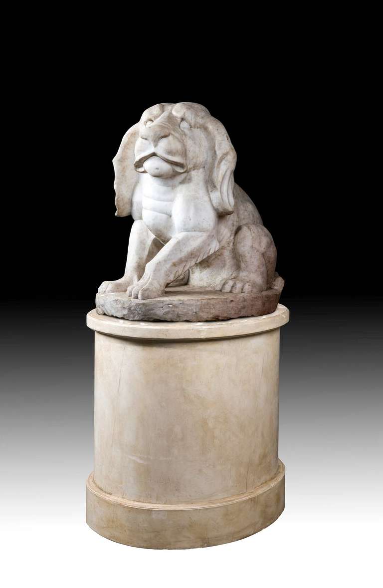 A charming large marble figure of a puppy, mid-19th century, European.

