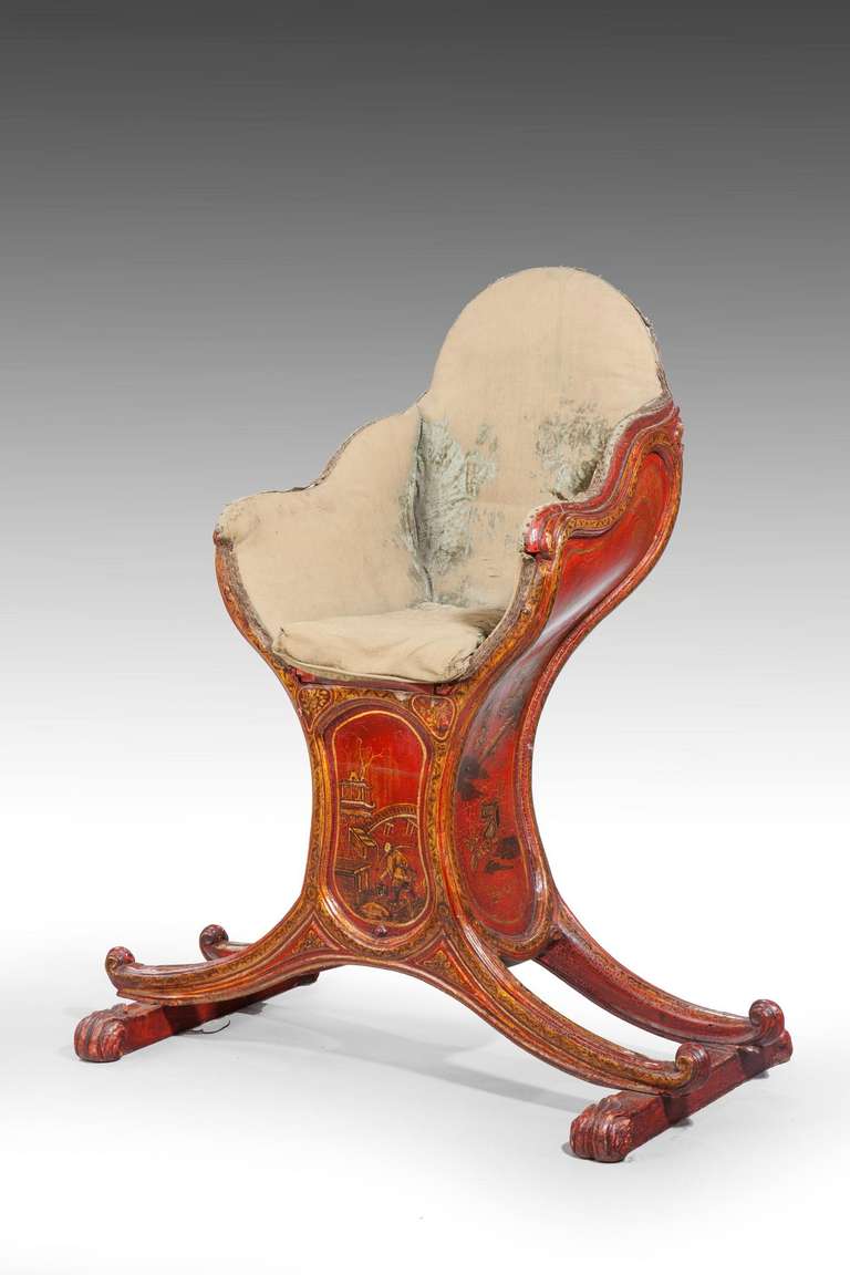 A rare mid-18th century Gondoliers chair retaining largely original chinoiserie decoration on a strong red ground the remnants of the original upholstery in velvet.

RR.