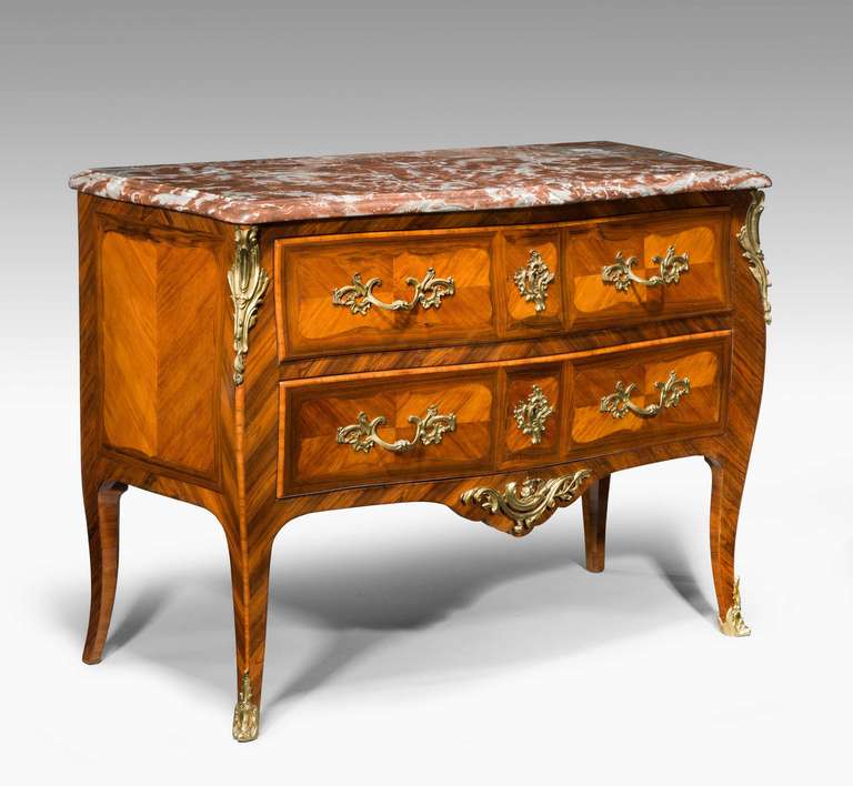 Louis XV period kingwood bombe commode, the drawer fronts quartered with contrasting border.