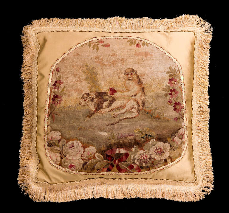 Early 18th century, French, wool with silk highlights. A scene from Aesop’s fables. A monkey with a somewhat strange hybrid animal.

RR.