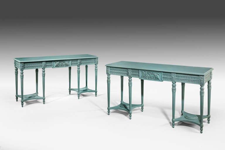 A fine pair of mid-19th century slender pier tables with very well executed carving, the soft blue-green color original but redecorated.

RR.