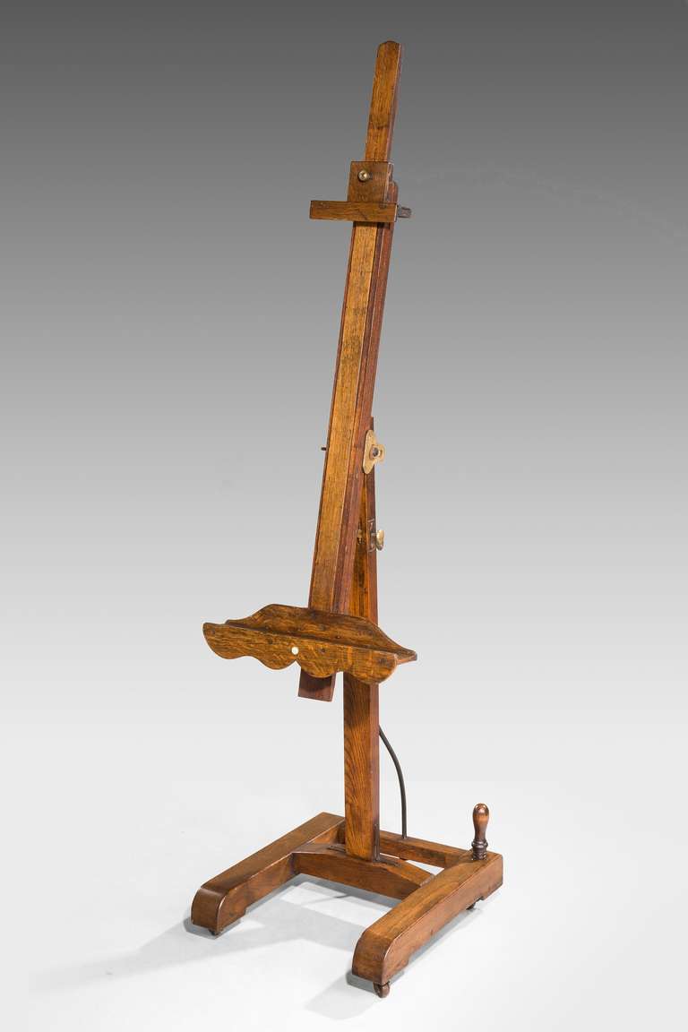 Good Gallery oak Easel, adjustable on a ratchet support, signed on an ivory tablet 'C Roberson and Company, 99 Long Acre 158 Piccadilly London.

C Roberson and Co has been manufacturing and supplying artists' materials since 1810. 

The firm of
