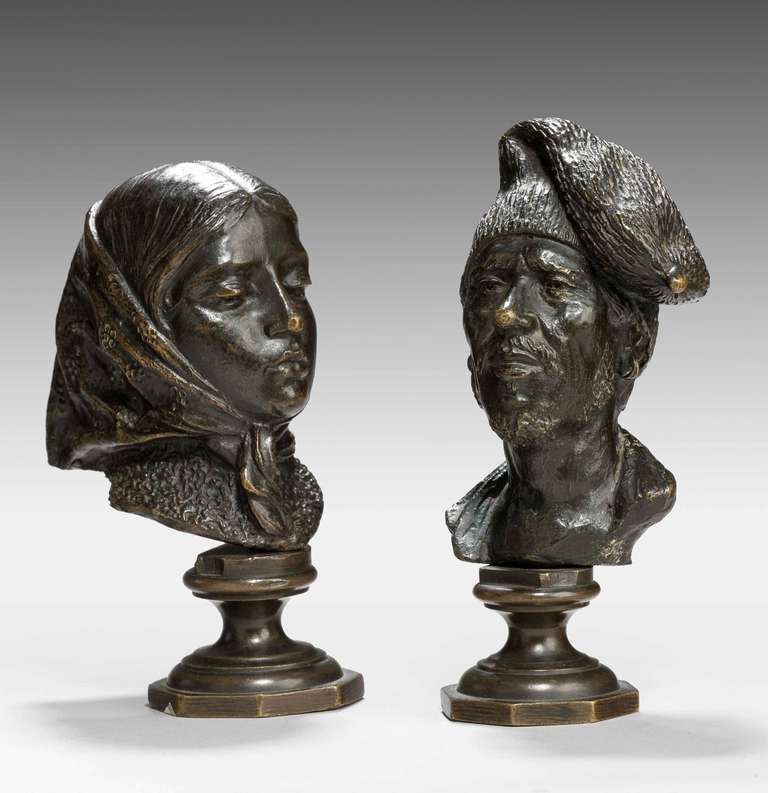Pair of mid-19th century French desk bronzes retaining original dark brown patina surfaces.