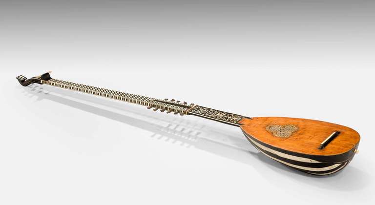 Fine example of a late 17th Century Theorbo/Chitarrone, bone inlay in a late 19th Century shagreen type case, the interior with crush silk lining.See Footnote.

Provenance
Theorboes were developed during the late sixteenth century, inspired by