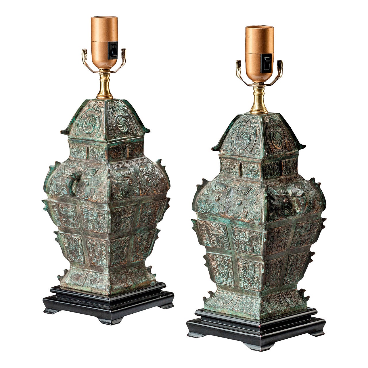 Pair of 'Archaic' Bronze Lamps