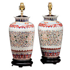 Pair of Large Ovoid Pottery Lamps