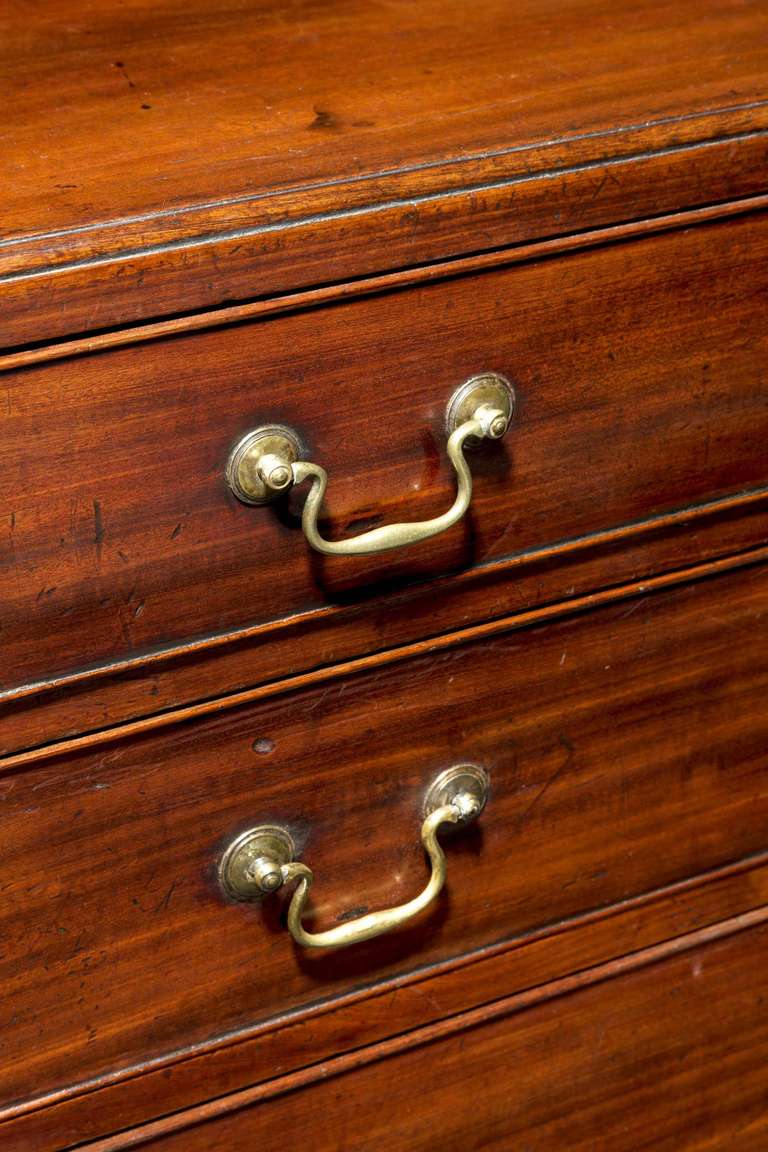 A George III mahogany caddy-top Chest of Drawers of small proportions with period swan neck handles on period bracket feet.

RR