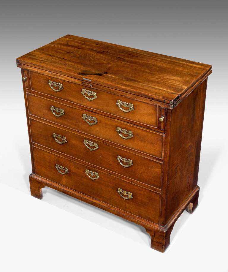 A very good and original Chippendale period mahogany Bachelor Chest of small proportions retaining original bracket feet and brasses.