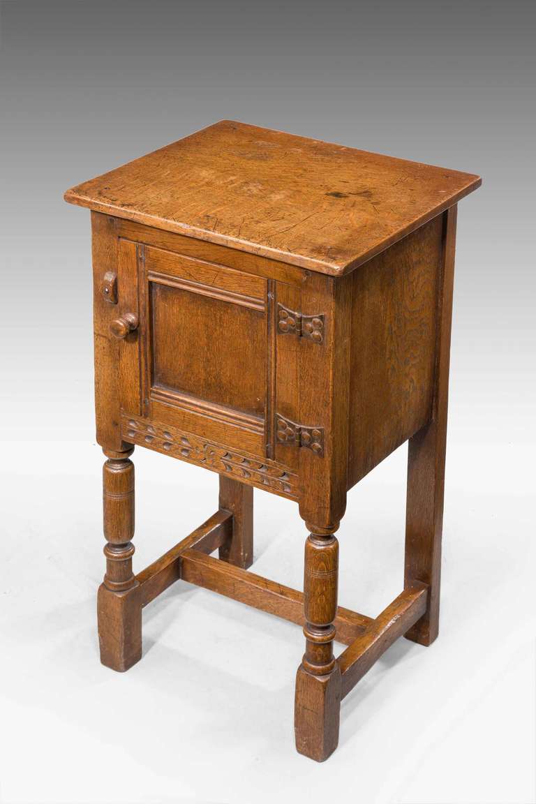 An early 20th century oak night cupboard baring the label smart brown notts. 

Smart & Brown Ltd, cabinet makers, upholsterers, carpet warehousemen, and decorators, five, seven and nine Bridlesmith Gate, Nottingham.

Unlike many large furnishing