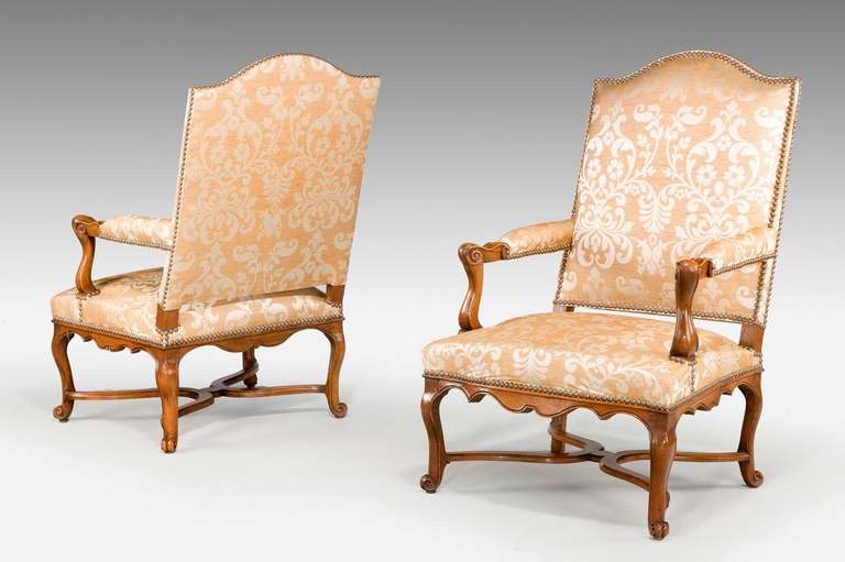 A pair of Louis XIV period beech open armchairs in very good original condition

