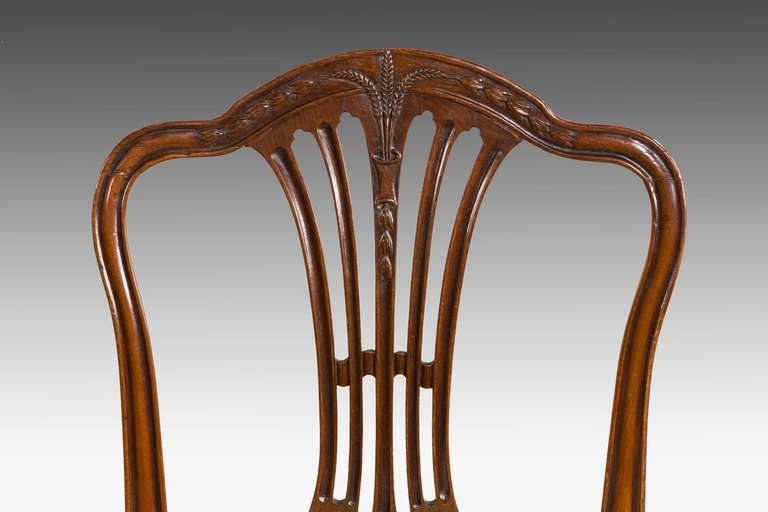  Eight George III Period Dining Chairs with Camel Shaped Backs 1