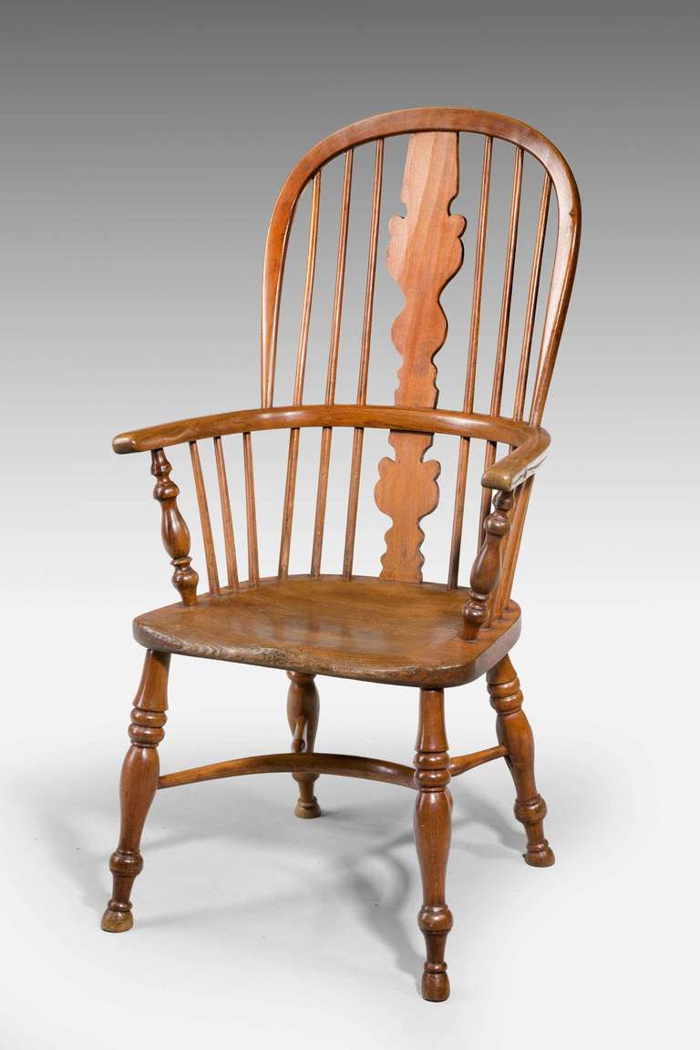 Mid-19th century elm and ash high back windsor chair, with crinoline stretcher

Provenance
The windsor chair is established as one of the great classics of English country furniture. They were made by village craftsmen to traditional designs in