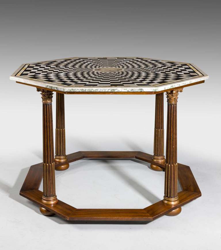 An unusual late 19th Century mahogany gilt bronze and marble Centre Table in entirely original and unrestored state. The top with contrasting marble block work.

RR