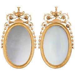Pair of 19th Century Gilt Wood and Gesso Oval Mirrors