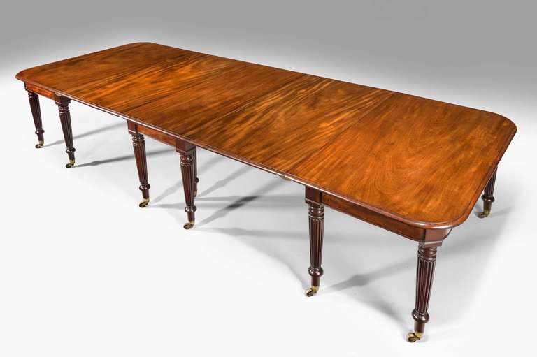 A good Regency period three-part mahogany dining table with a drop-leaf centre section which can be used with or without the end sections, exceptionally finely figured timber.

The price of dining tables, Richard Gillow wrote in 1786, depended on
