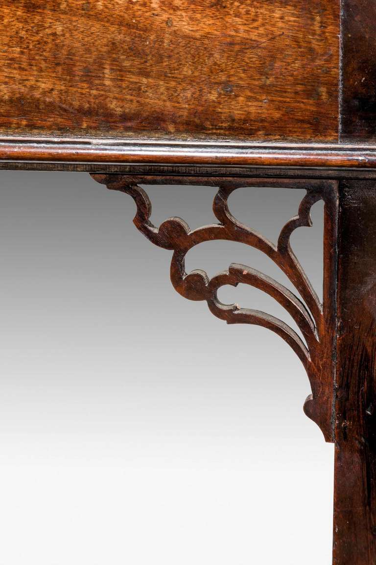 A good Chippendale period mahogany Serving Table, the corner brackets very finely carved with good colour and patina standing on square section supports ending in block feet.

RR