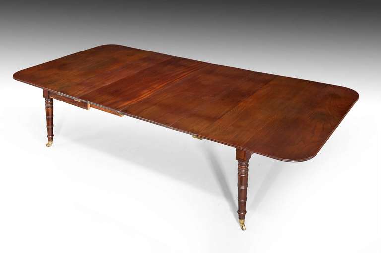 A most useful 19th century extending mahogany dining table, capable of seating from six to ten persons in absolute comfort, the extending undercarriage allowing the additional original leaves to extend the table as per the images, very good dense