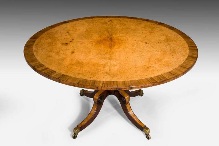 Regency period Amboyna breakfast table with good crossbanded edge in rosewood.

RR.