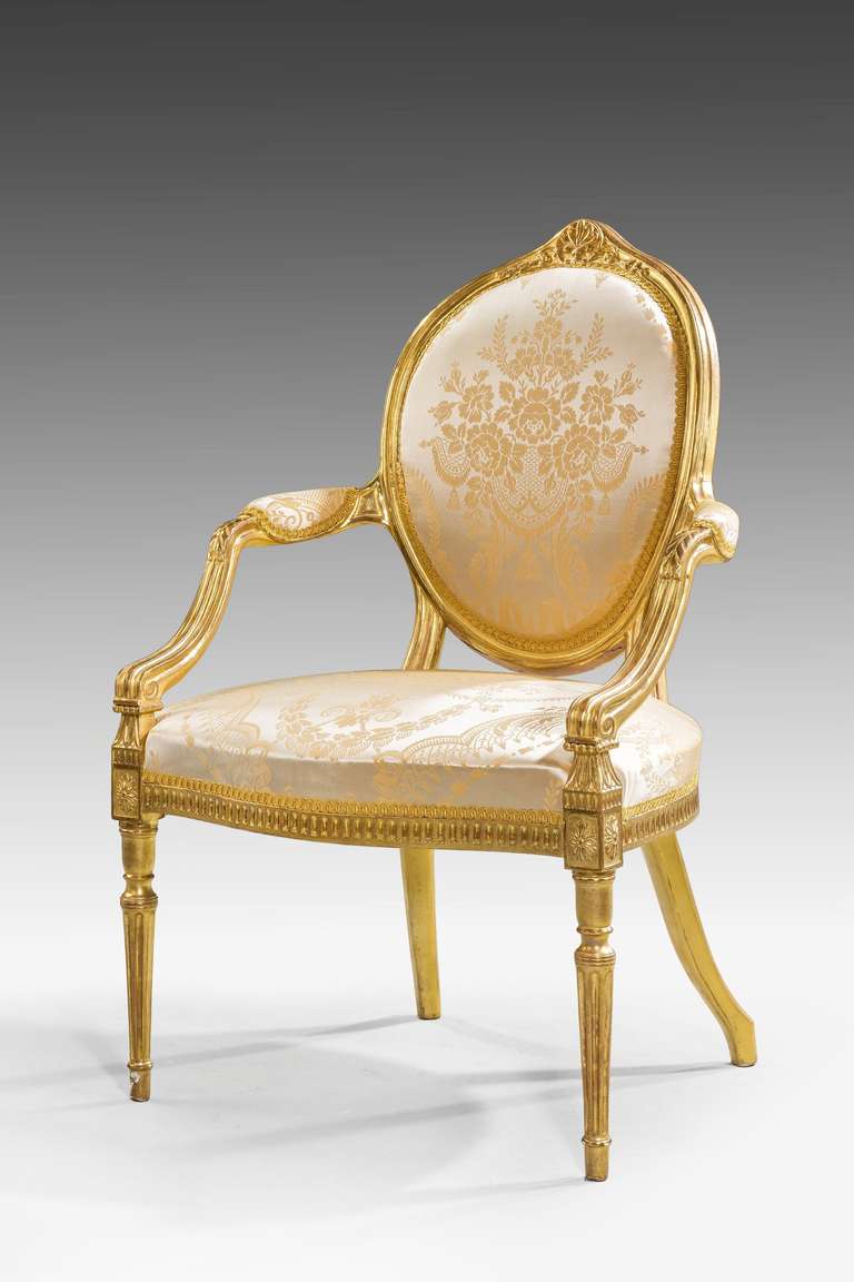 A good George III giltwood elbow chair with finely carved decoration.

RR.