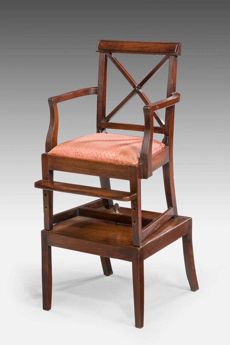 A good George III period mahogany Child's Chair on an original stand, the 