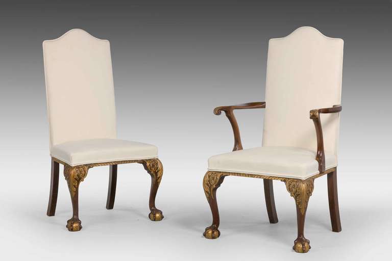 A very good set of eight (six + two) walnut and parcel-gilt chairs of mid-18th century design, the knees and claw and ball feet very well carved with softly gilded highlights. Mid-20th century, excellent overall condition.

            
             