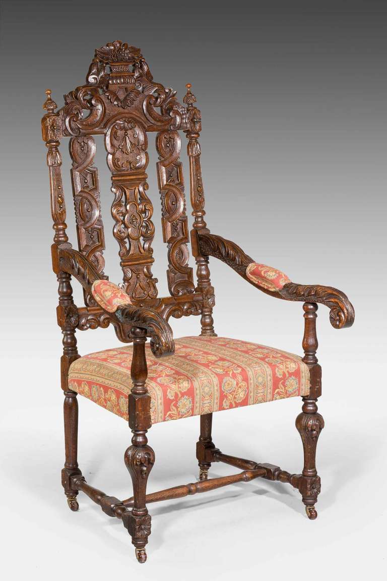 A finely carved pair of 17th century style oak chairs made in the late 19th century, in excellent overall condition.
