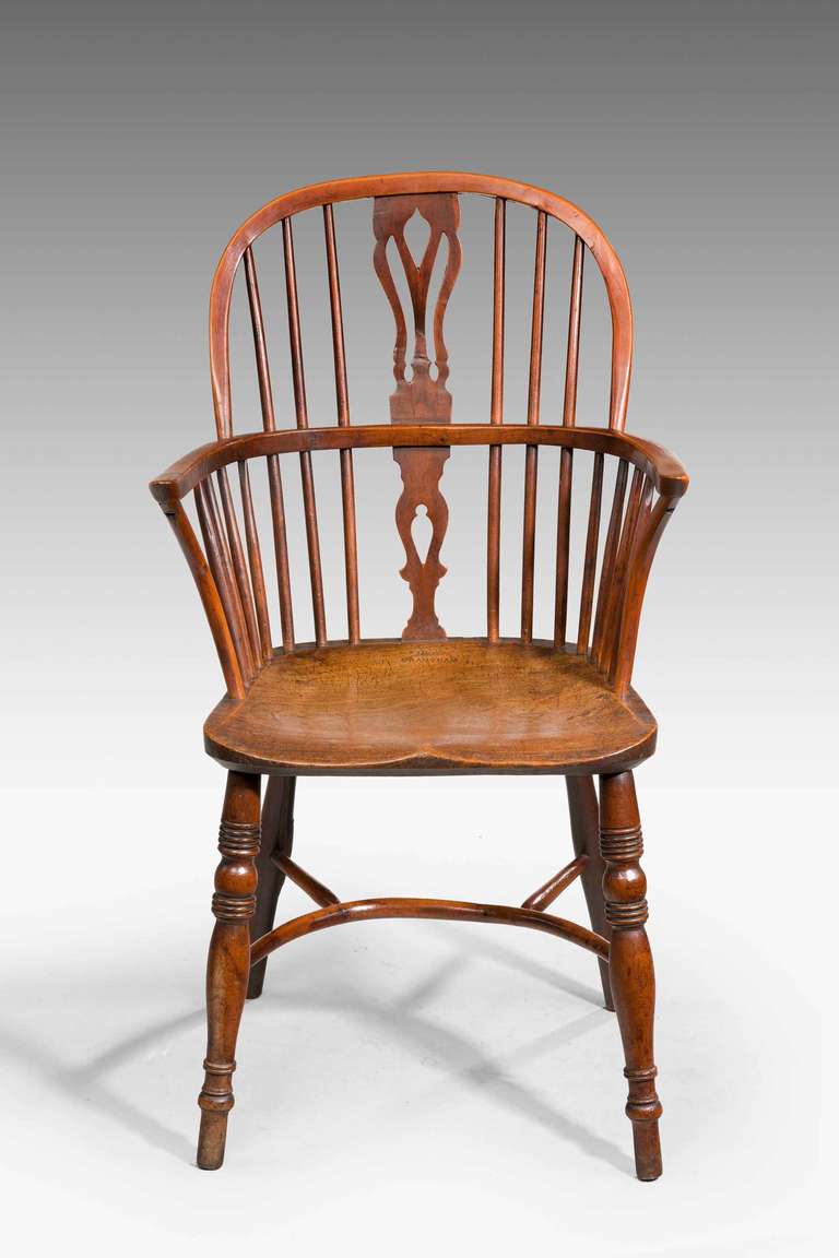 Early 19th Century yew tree Windsor Chair ,with cut back arms, stamped AMOS GRANTHAM to the seat, upper back splat with old repair.

John Amos lived and worked at his estate cottage at Little Gonerby, a short distance from the major chair-making